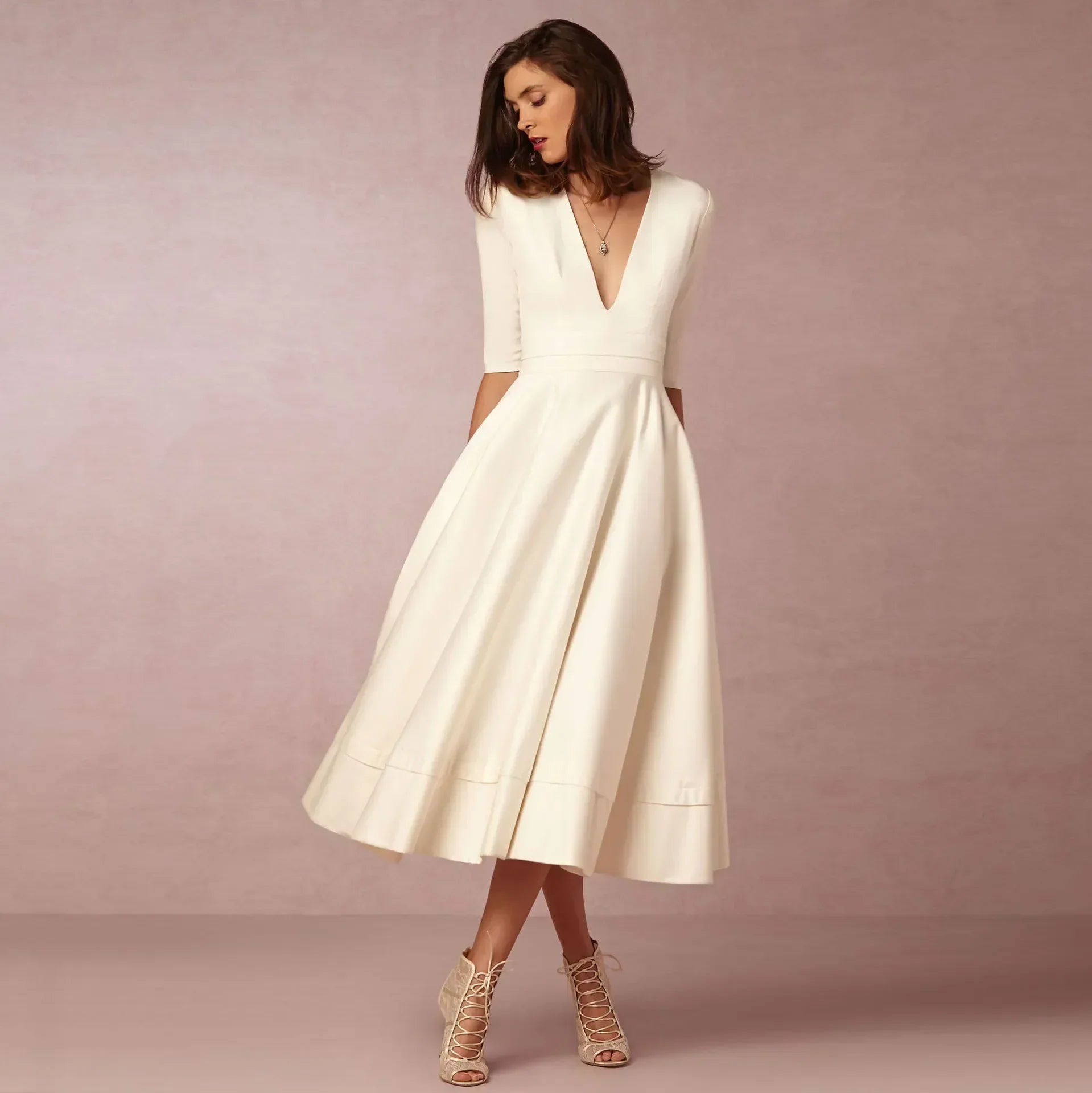 Deep V-Neck Fit-and-Flare Mid-Length Dress with Half Sleeves and Side Pockets — back view