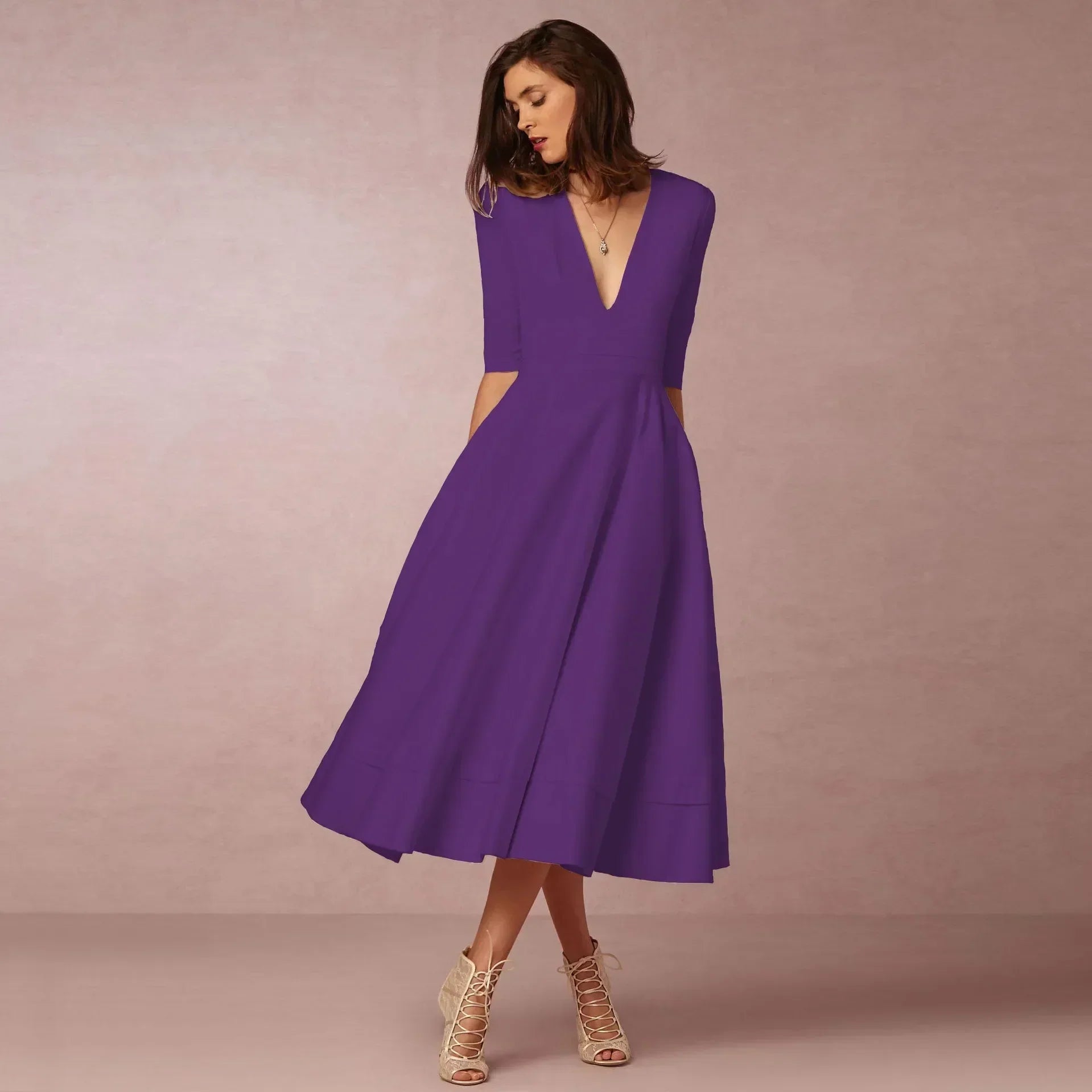 Deep V-Neck Fit-and-Flare Mid-Length Dress with Half Sleeves and Side Pockets — fabric detail