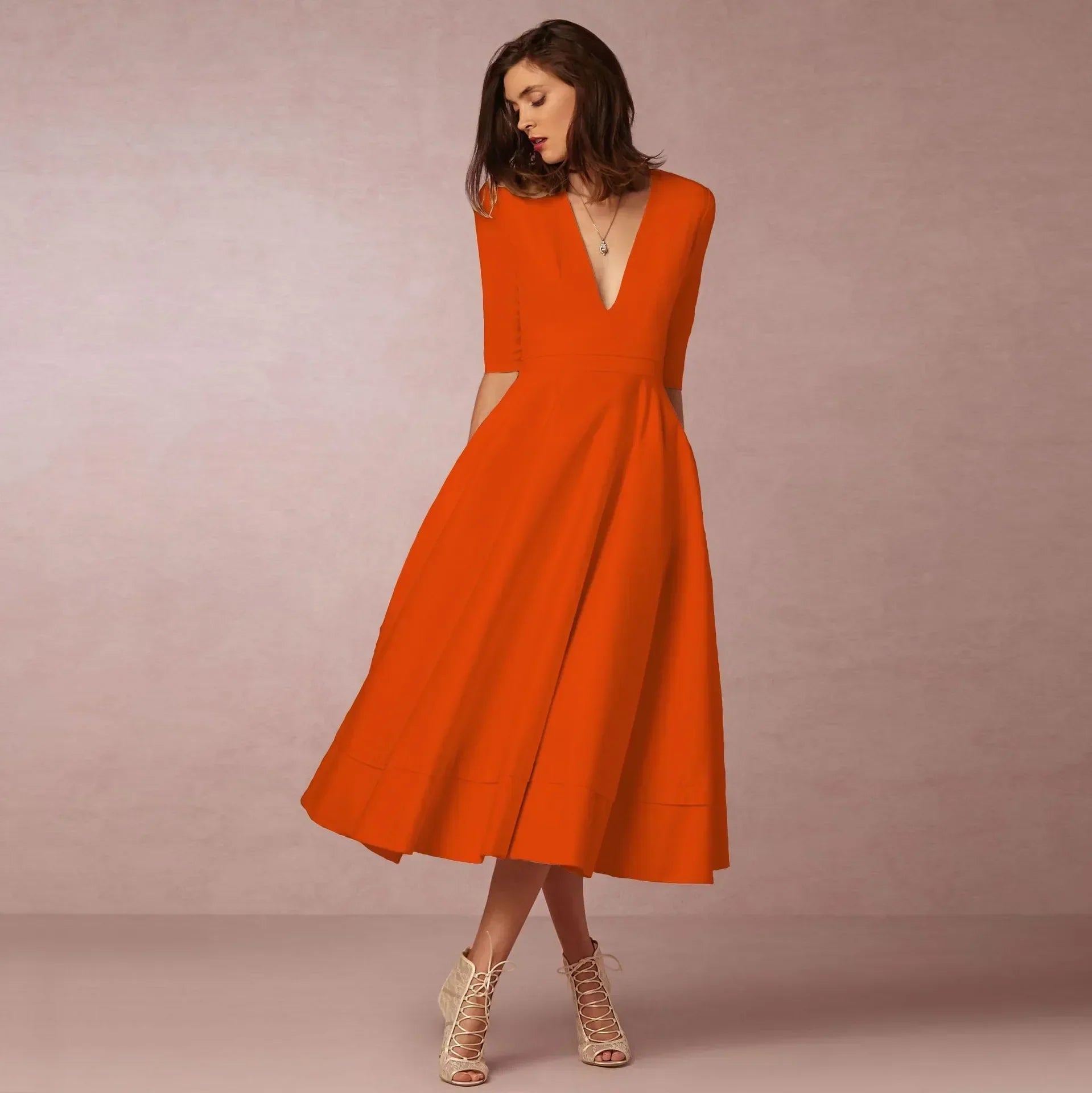 Deep V-Neck Fit-and-Flare Mid-Length Dress with Half Sleeves and Side Pockets — fit overview