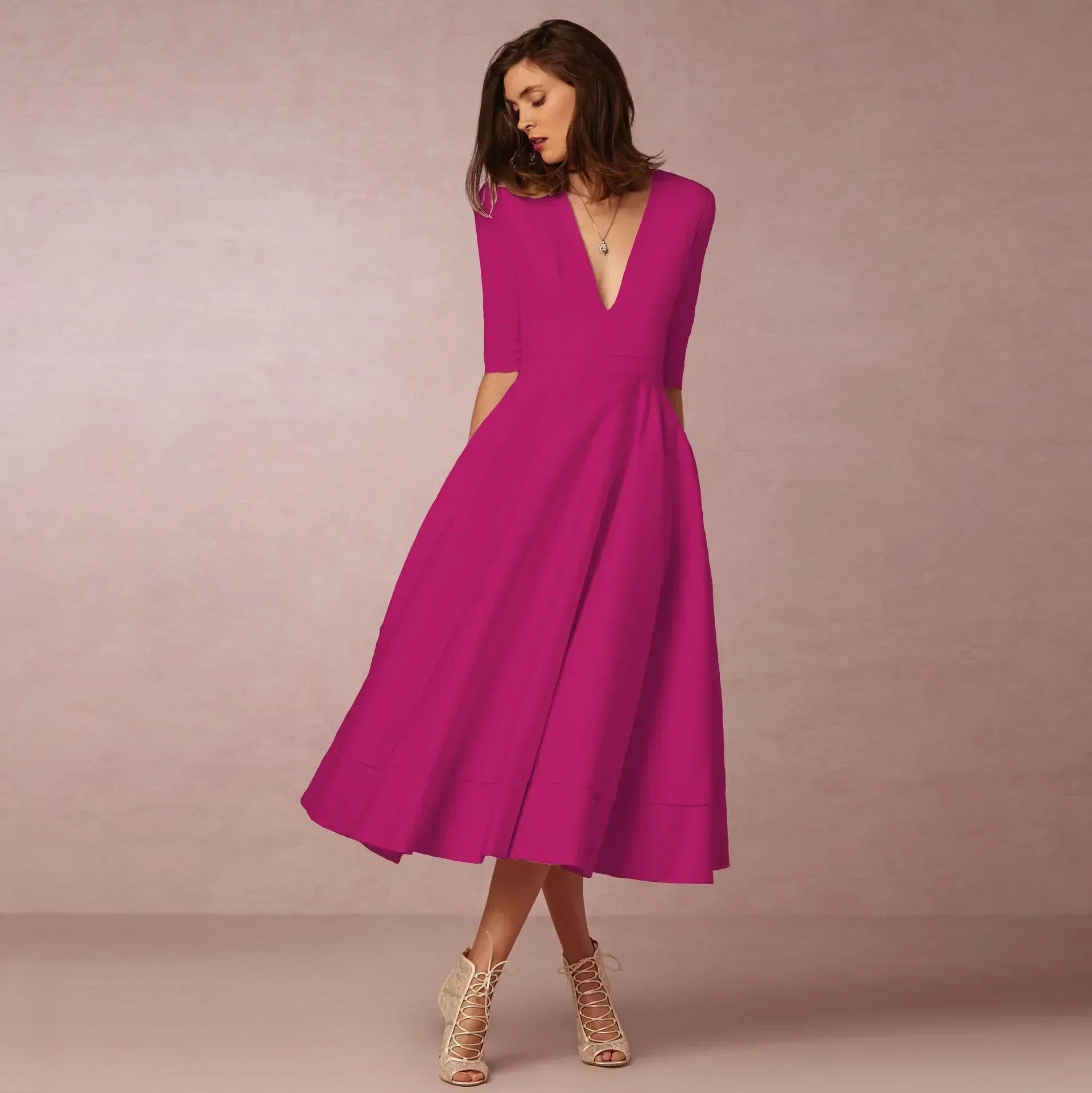 Deep V-Neck Fit-and-Flare Mid-Length Dress with Half Sleeves and Side Pockets — model wearing