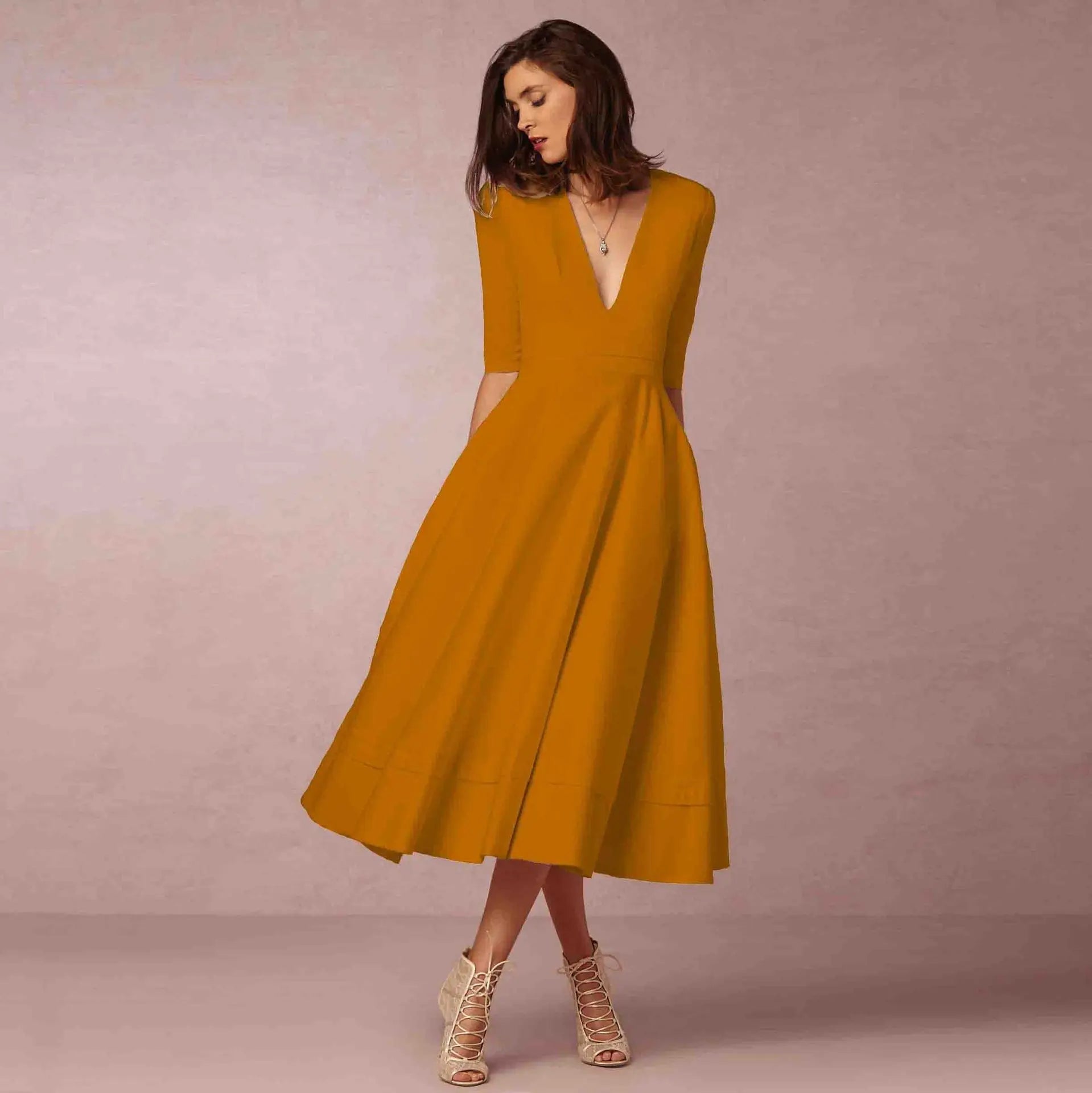 Deep V-Neck Fit-and-Flare Mid-Length Dress with Half Sleeves and Side Pockets — side view