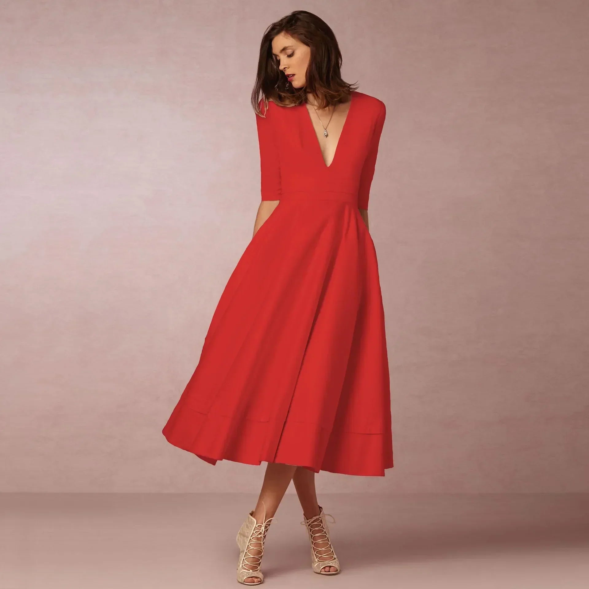 Deep V-Neck Fit-and-Flare Mid-Length Dress with Half Sleeves and Side Pockets — styling detail