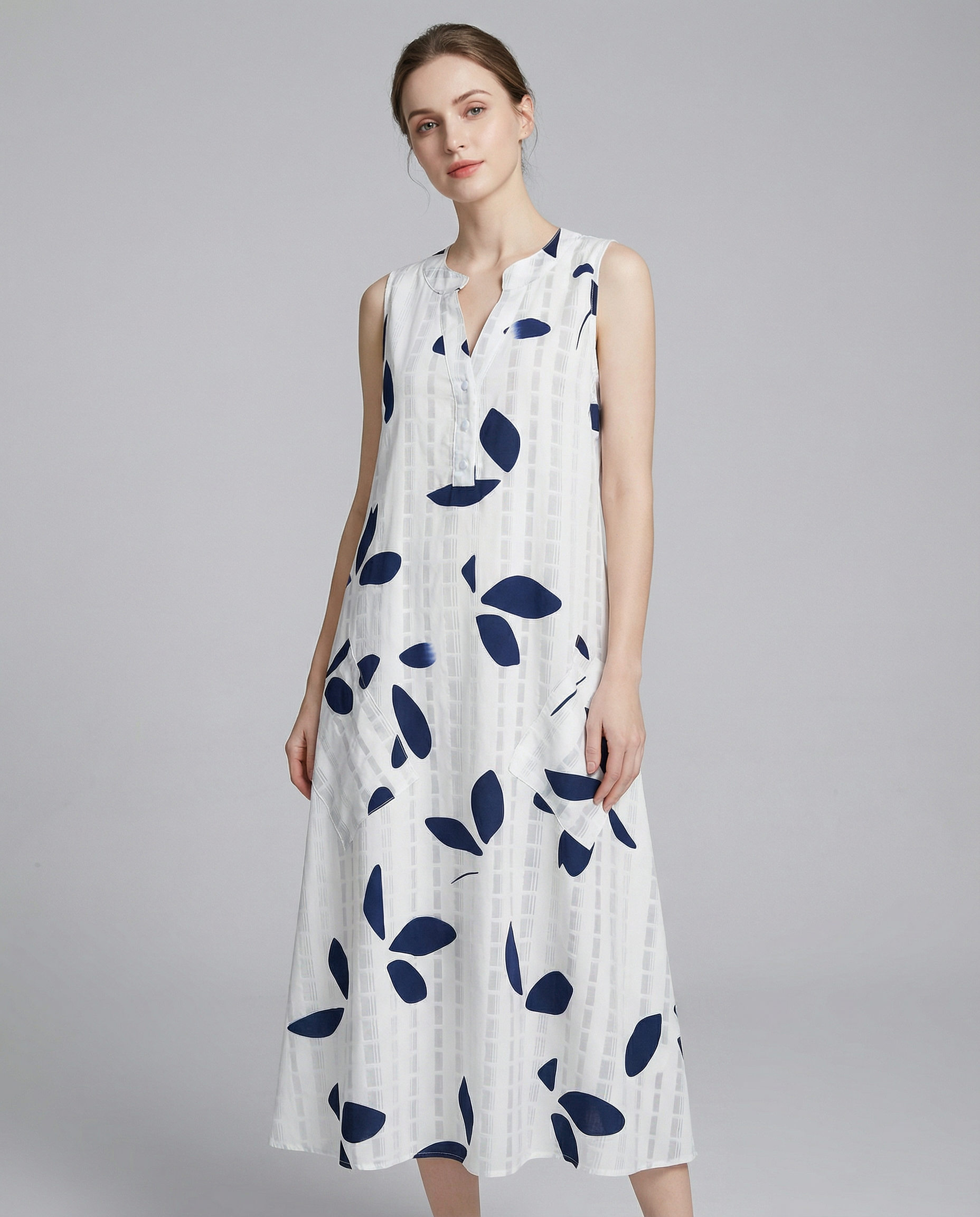 Leaf Print Maxi Dress – Stylish V-Neck Sleeveless Summer Outfit — detail view