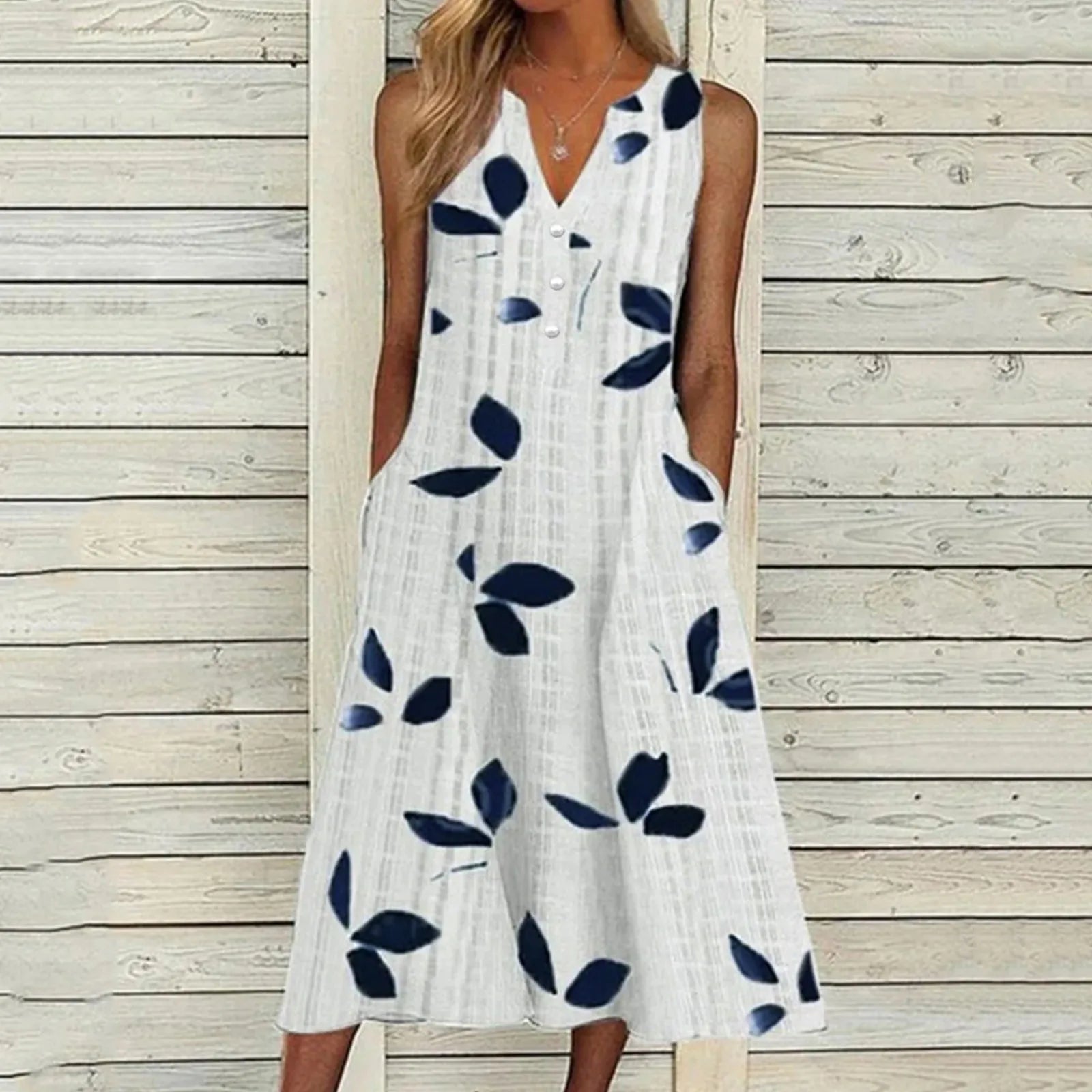 Leaf Print Maxi Dress – Stylish V-Neck Sleeveless Summer Outfit — model wearing