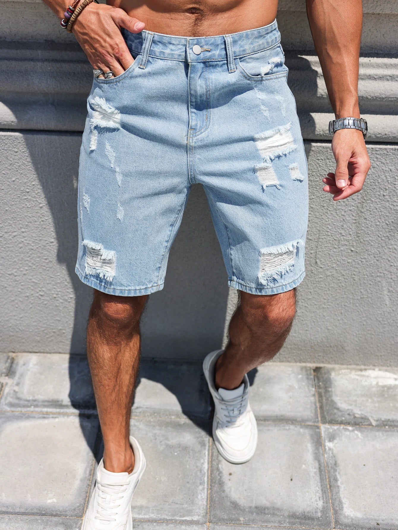 Men's Ripped Denim Shorts – Casual Light Blue Design for Summer Outings — close-up