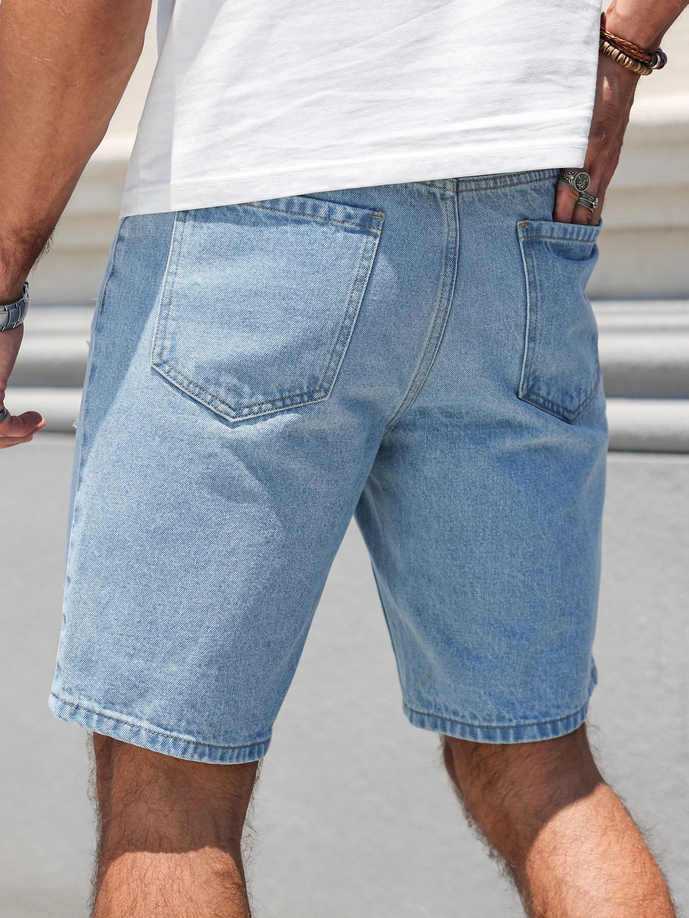Men's Ripped Denim Shorts – Casual Light Blue Design for Summer Outings — detail view