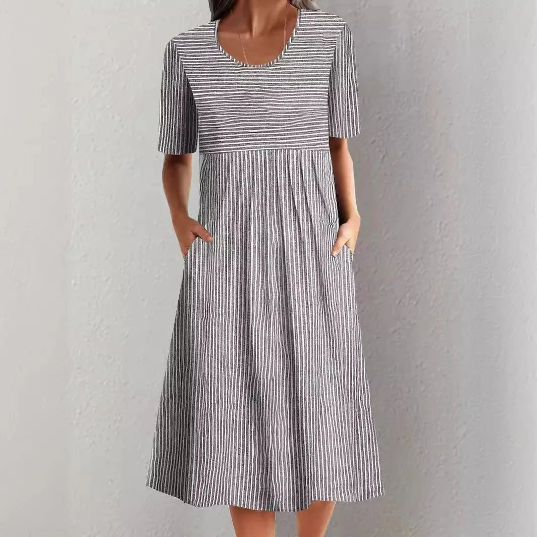 Summer Stripe Midi Dress – Casual O-Neck Design with Pockets for Effortless Warm Weather Style — side view