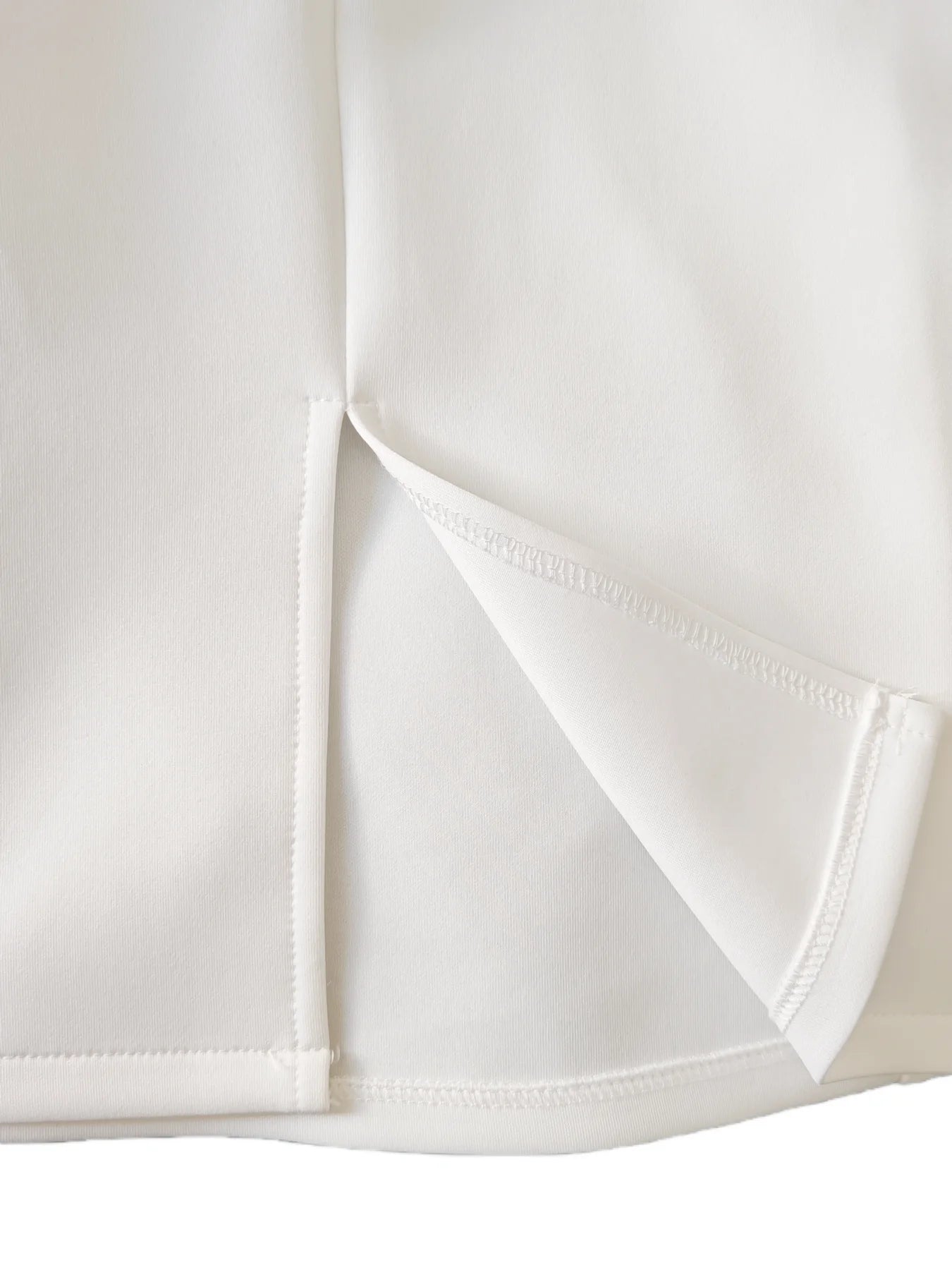 White Gown – Elegant Sleeveless Slim Fit for Holiday Parties — model wearing
