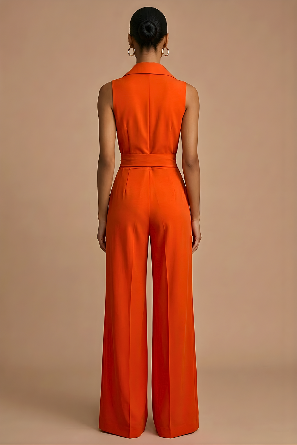 Women's Sleeveless Collar Neck Wide Leg Jumpsuit with Button Front and Waist Tie — model wearing